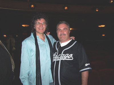Photo of Gino with a fan after the May 21st, 2005 show in Detroit, Michigan, USA at the Music Hall
